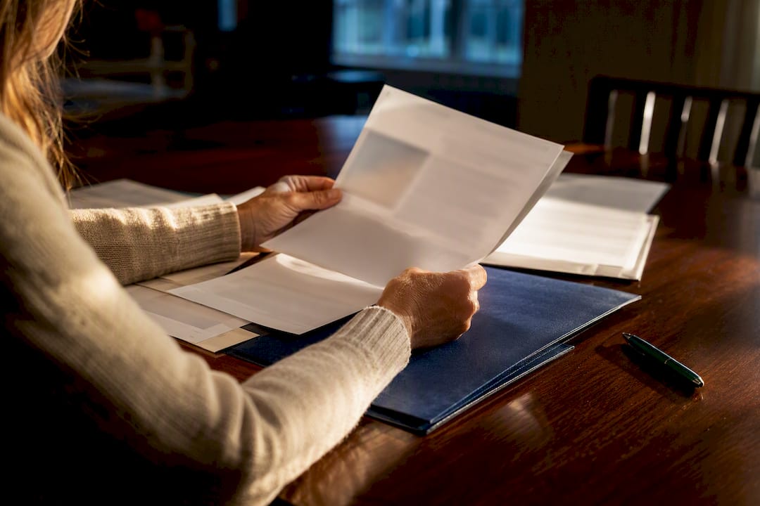 Parent reviewing financial aid documents