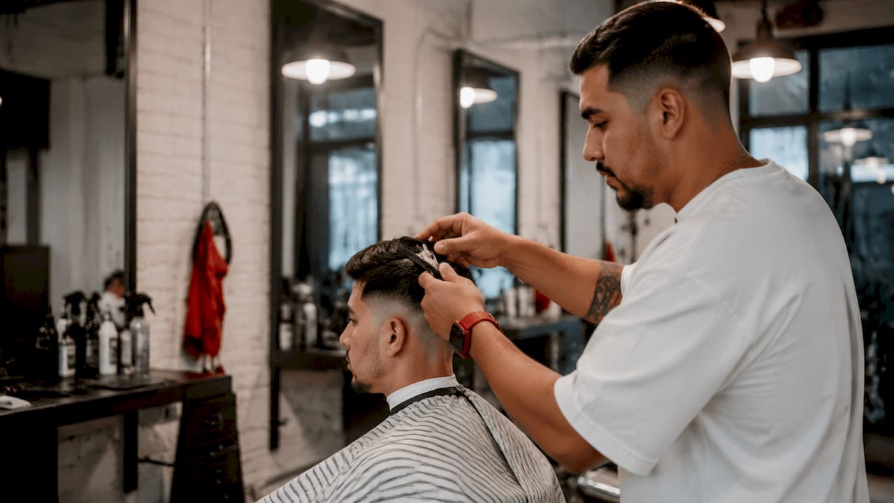 Child sitting in sensory-friendly barber chair