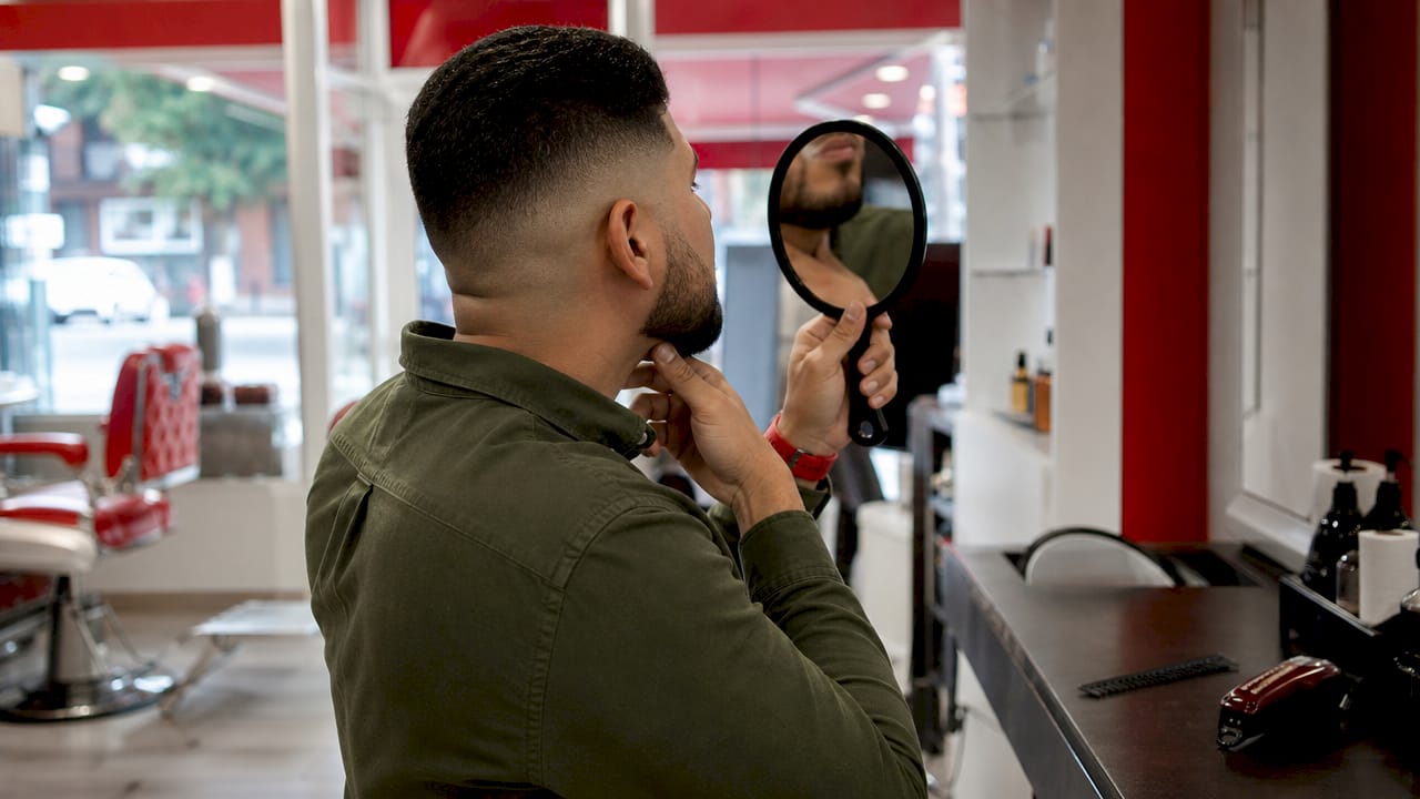 Close-up of clean neckline and fade haircut grooming details