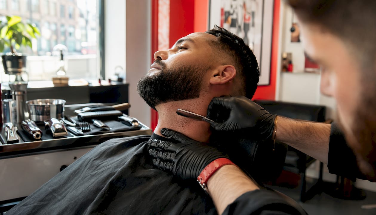 Barber razor defining man's beard edges