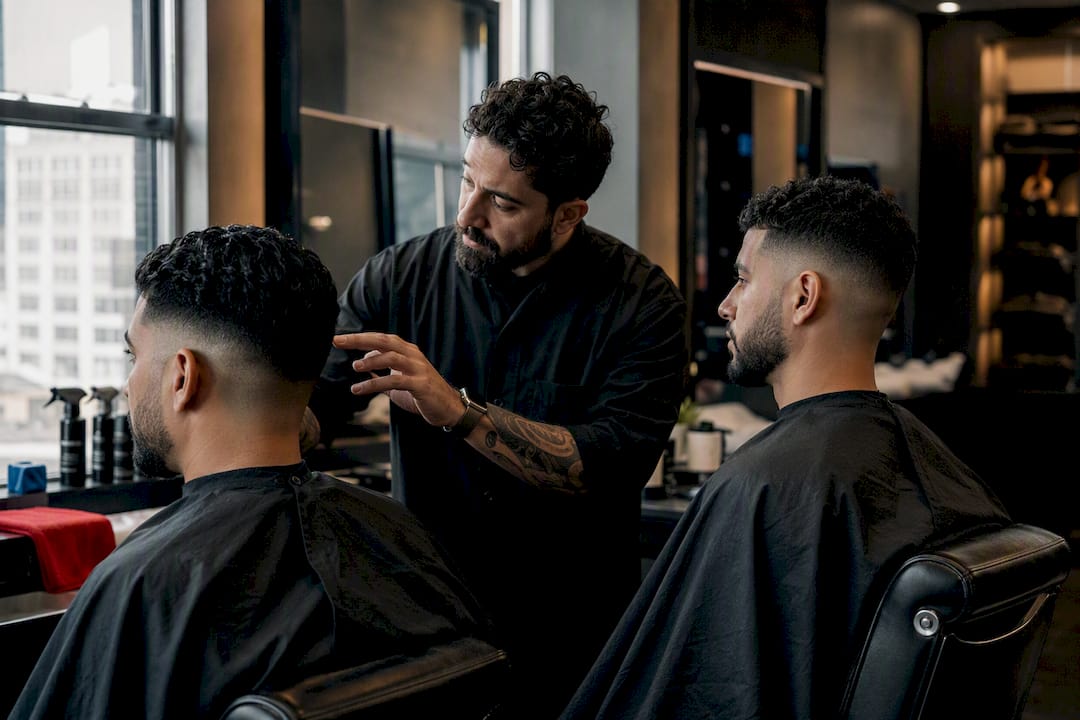 Low and mid fade haircuts compared side by side