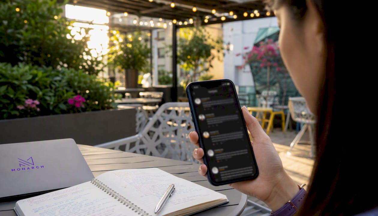 Hand holding smartphone reviewing plumber ratings