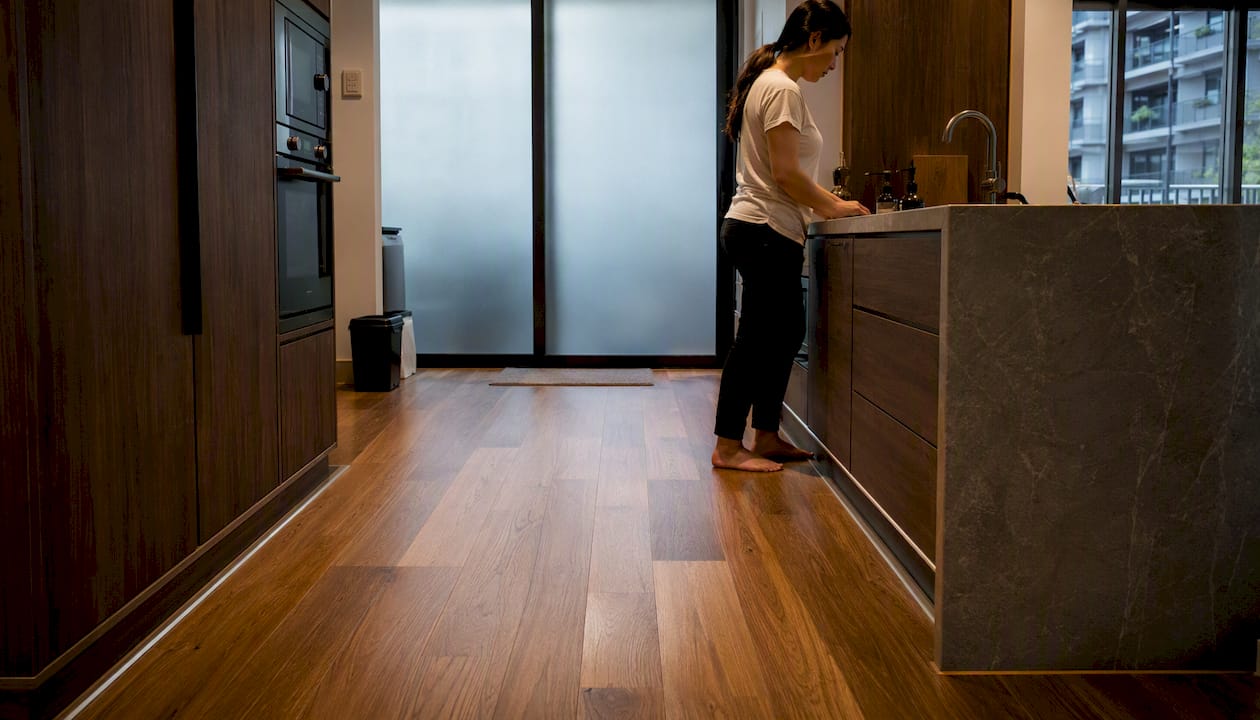 Coordinated flooring, cabinetry, and trim details