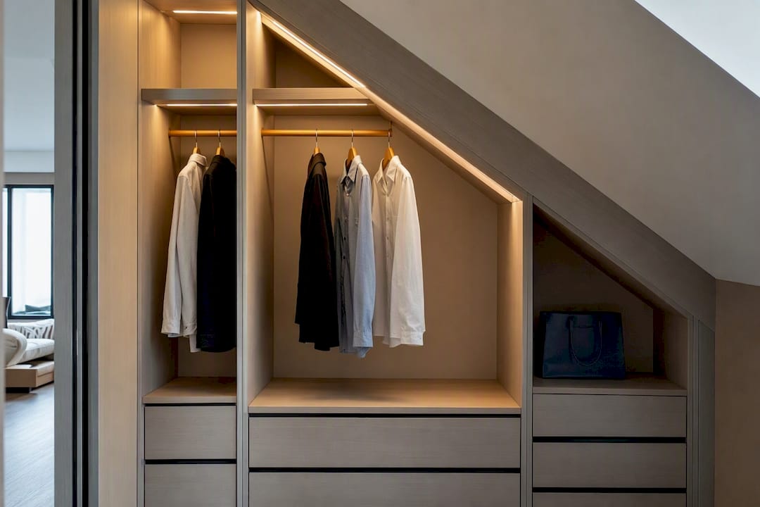 Custom wardrobe interior fitting sloped ceiling