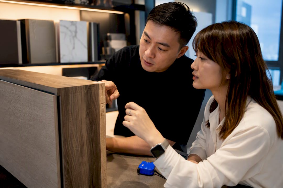 Singapore homeowner consulting an interior designer