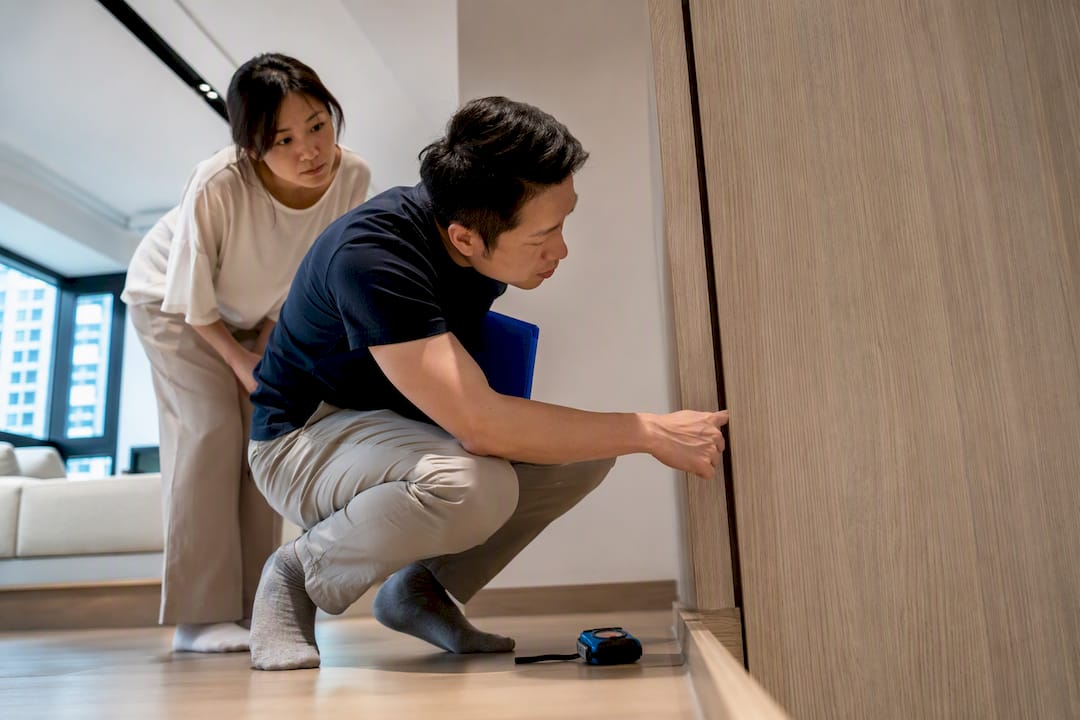 Singapore Asian team inspecting renovation handover