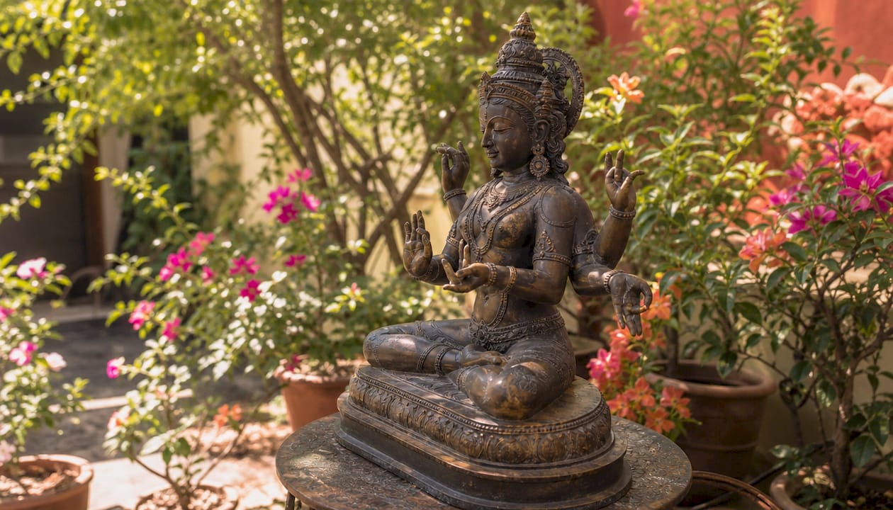 Close-up of Hindu goddess statue hands with mudras