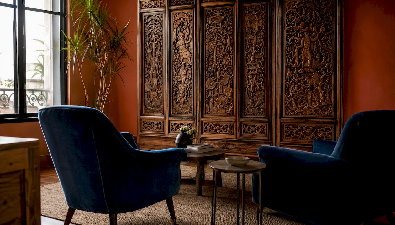 Living room featuring carved Asian screen and seating