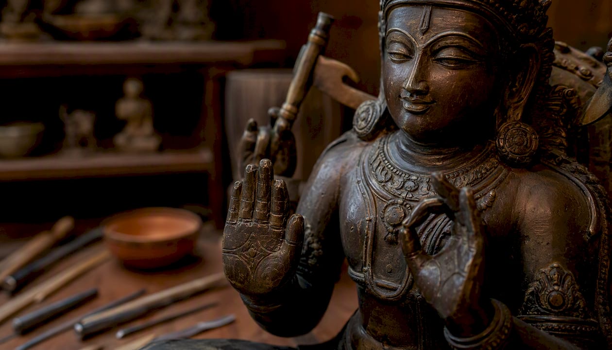 Close-up of lost-wax bronze Hindu statue details