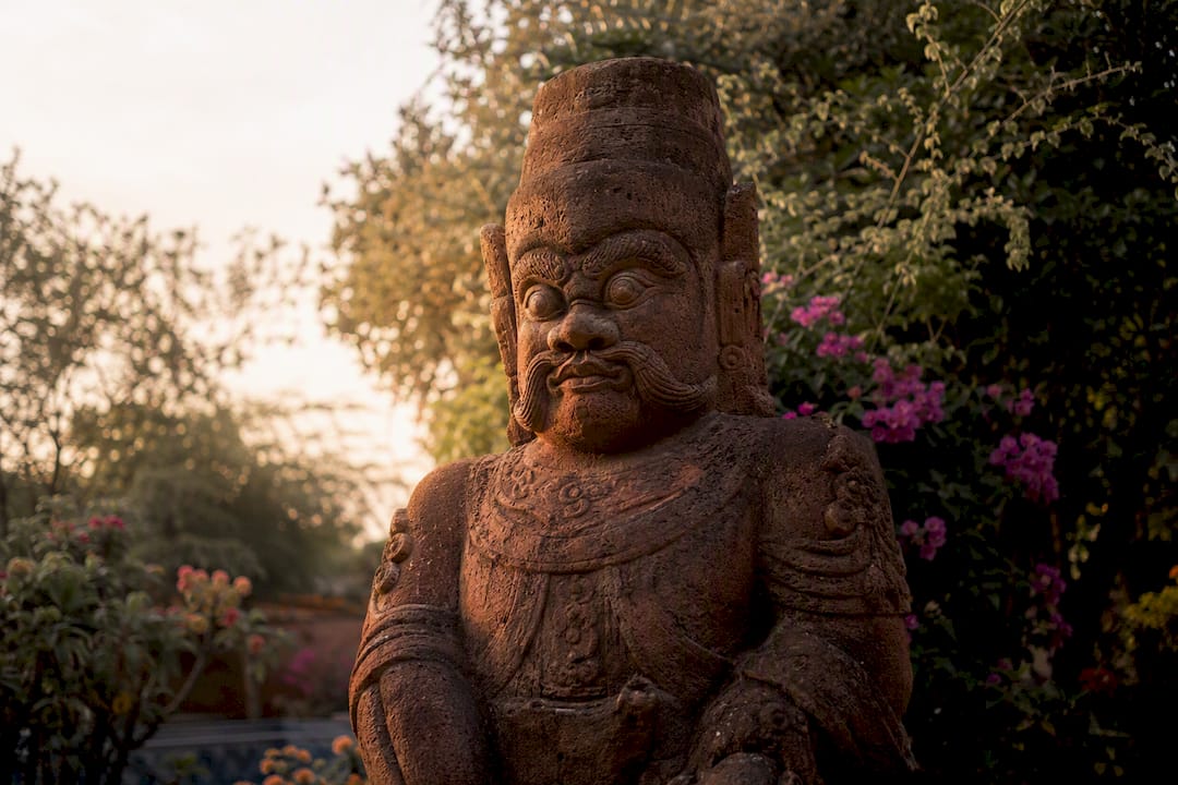 Cham stone guardian sculpture with distinct facial features