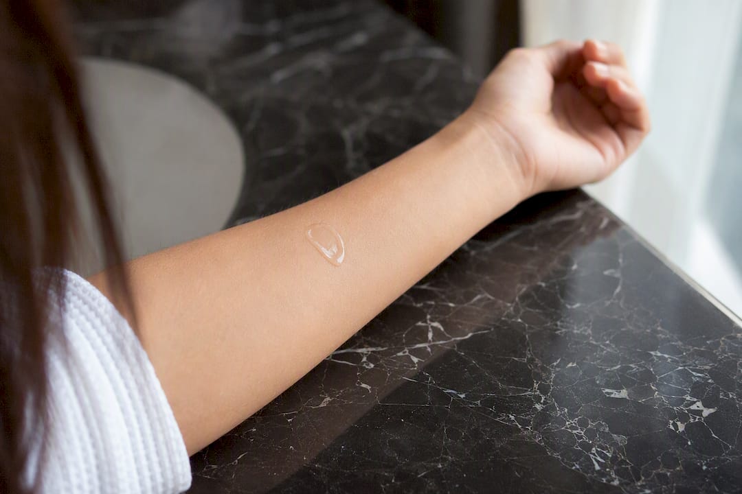 Skincare patch test on inner forearm