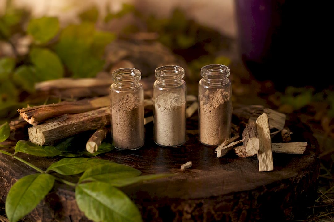 Glass vials with different licorice root extracts and botanicals