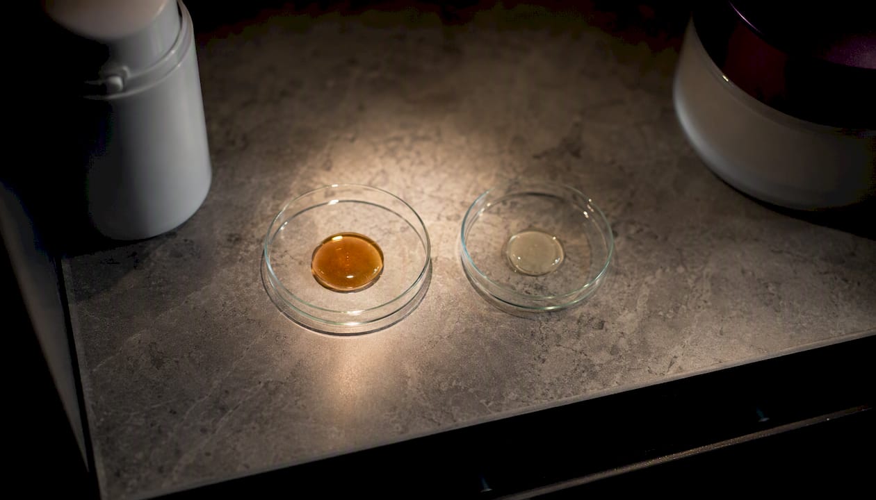 Serum color change beside protected skincare container