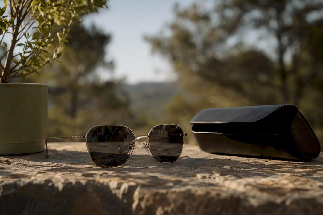 Thin metal wire frame sunglasses detail