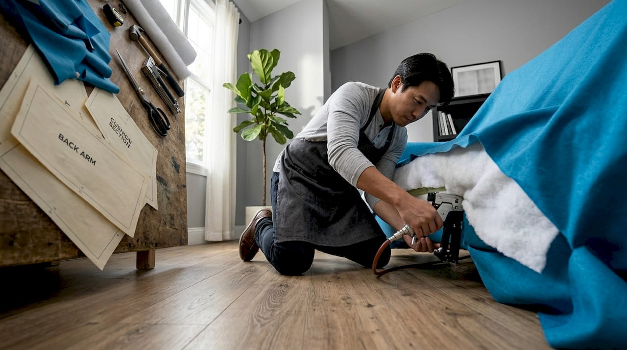 DIY sofa reupholstery tools and workspace