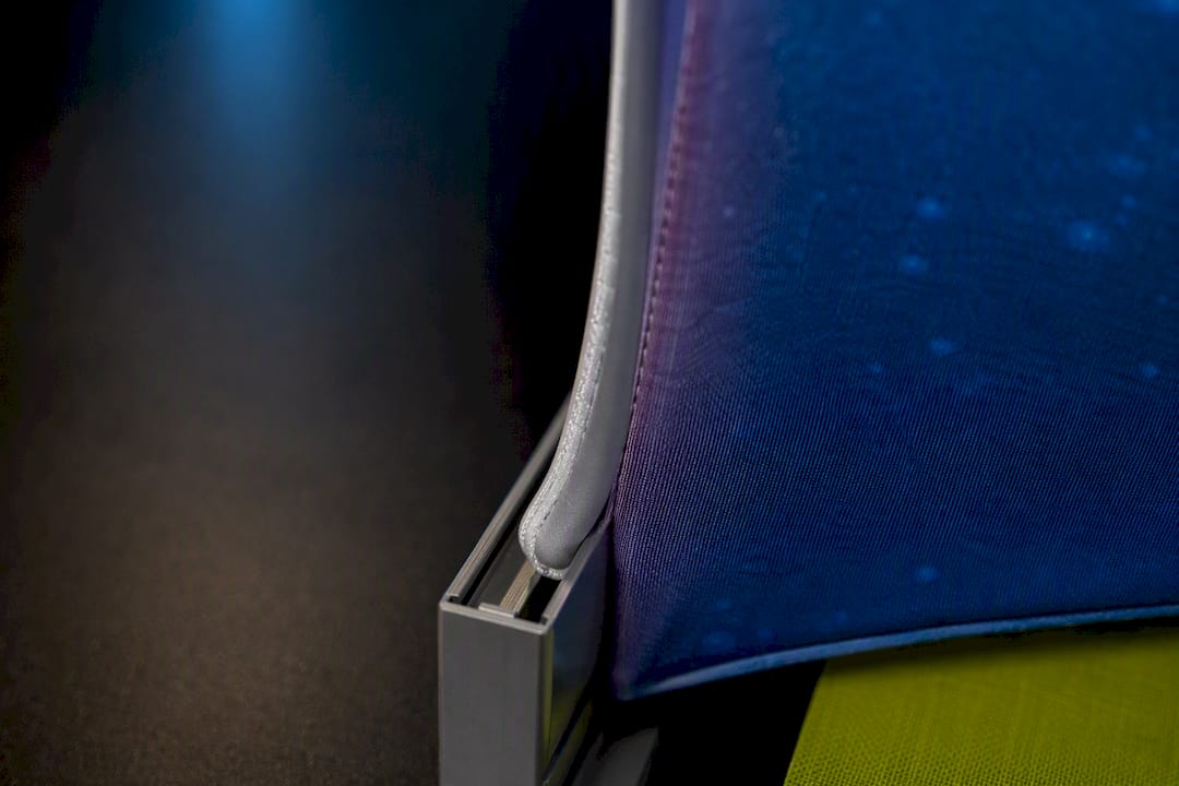SEG fabric bead entering aluminum frame groove