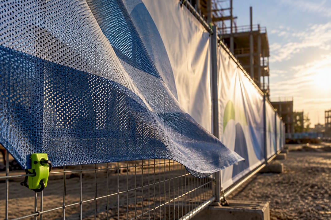 Mesh and vinyl banner materials in wind