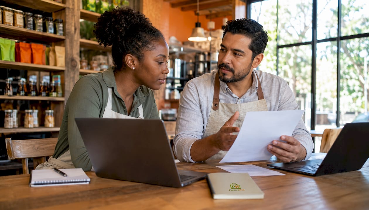 Two hospitality operators discussing software options