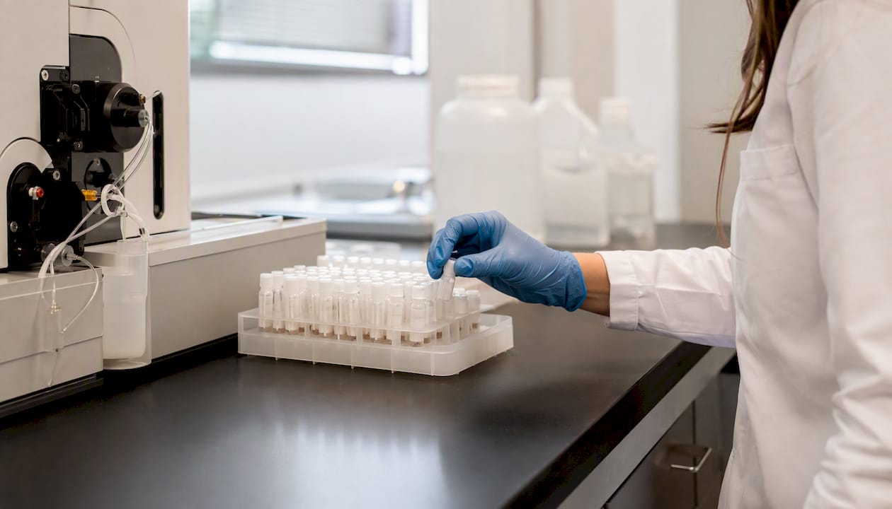 Scientist testing supplements for contaminants