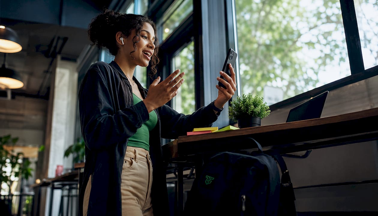 Young trader participating in community video call