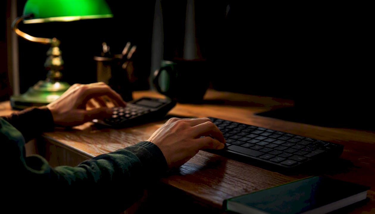 Trader hands adjusting Forex order settings