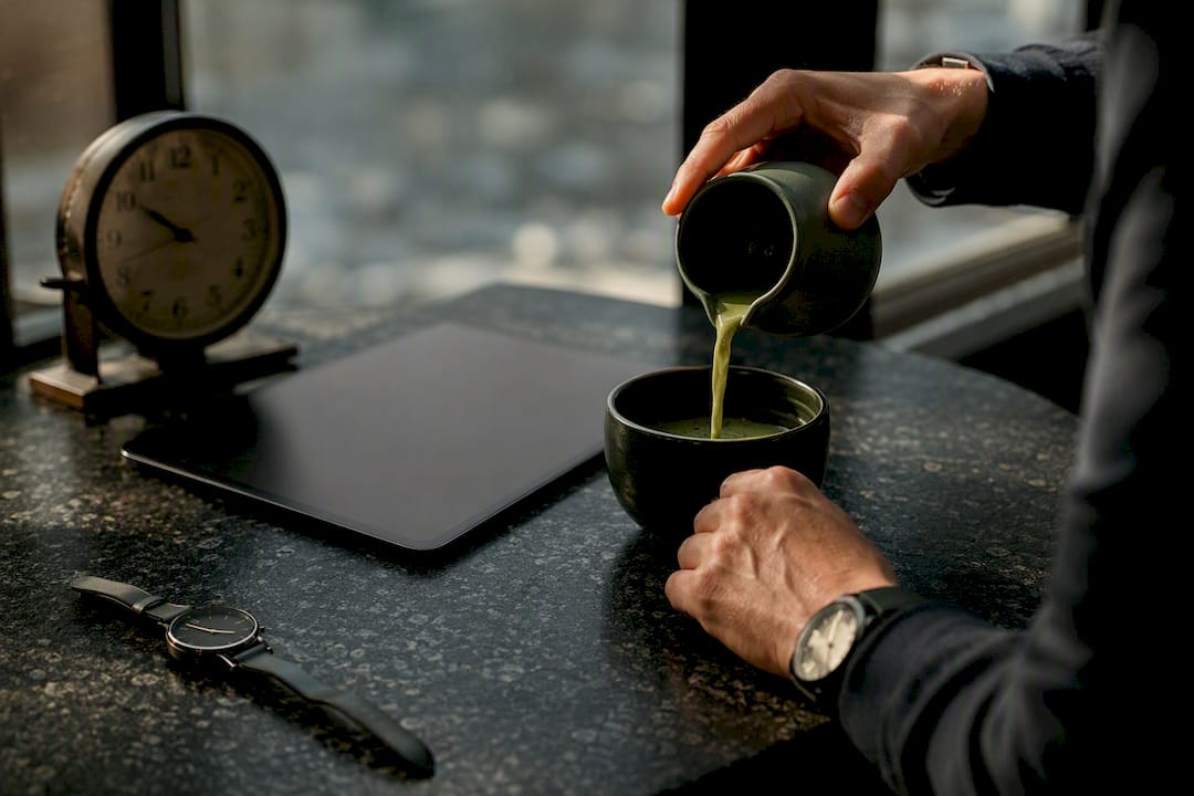 Trader pouring tea as pre-market ritual