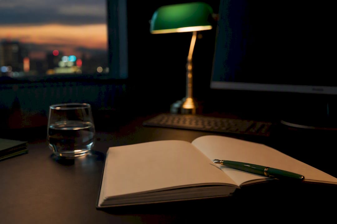 Dark office desk with crypto data preparation items