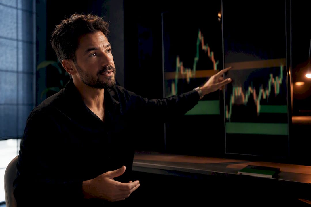 Analyst comparing forex market charts