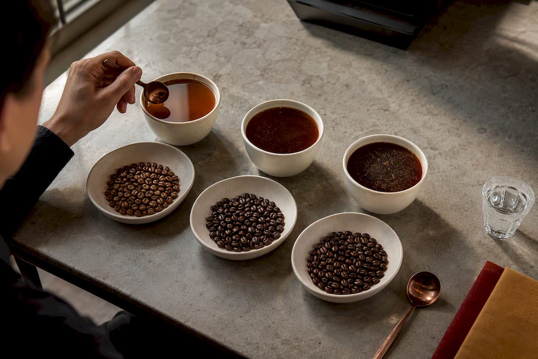 Three coffee samples prepared for cupping