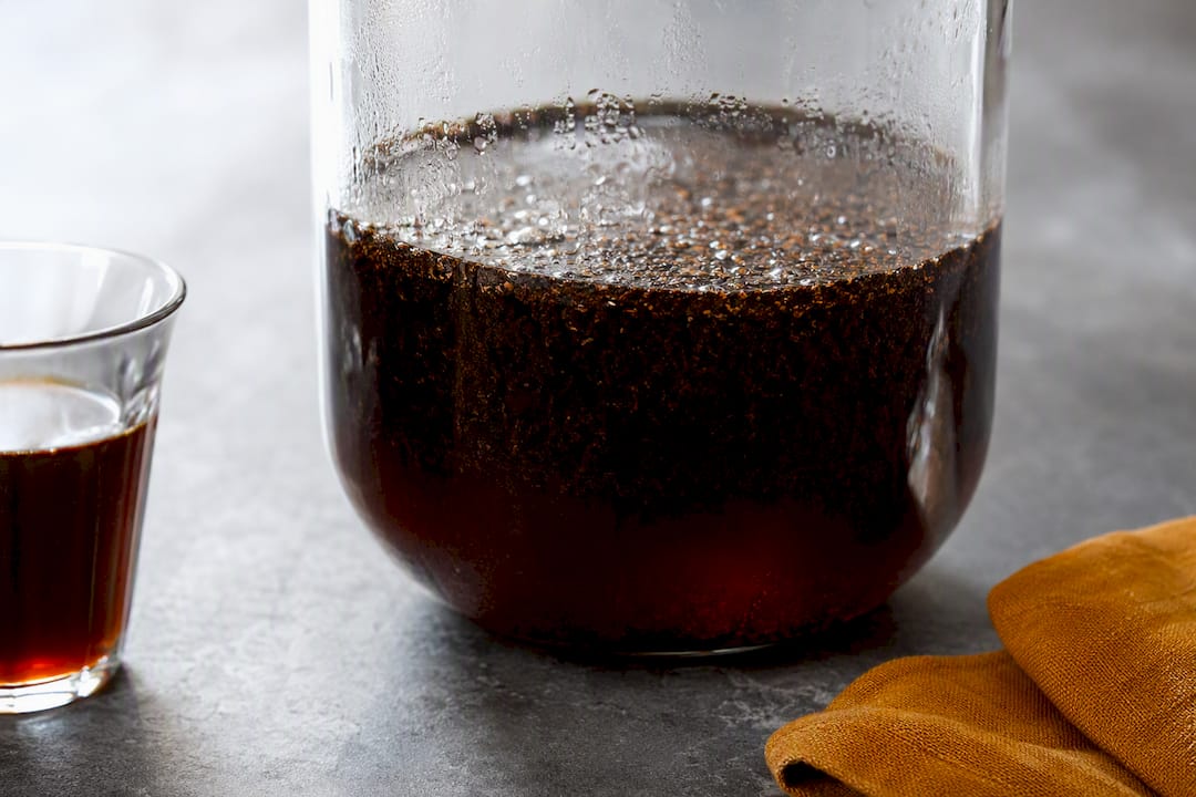 Cold brew grounds steeping in water