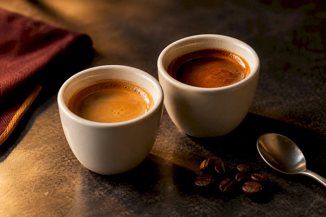 Espresso samples showing different crema textures
