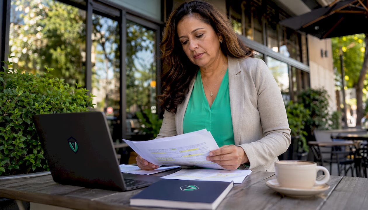 Woman reviewing zoning permit documents