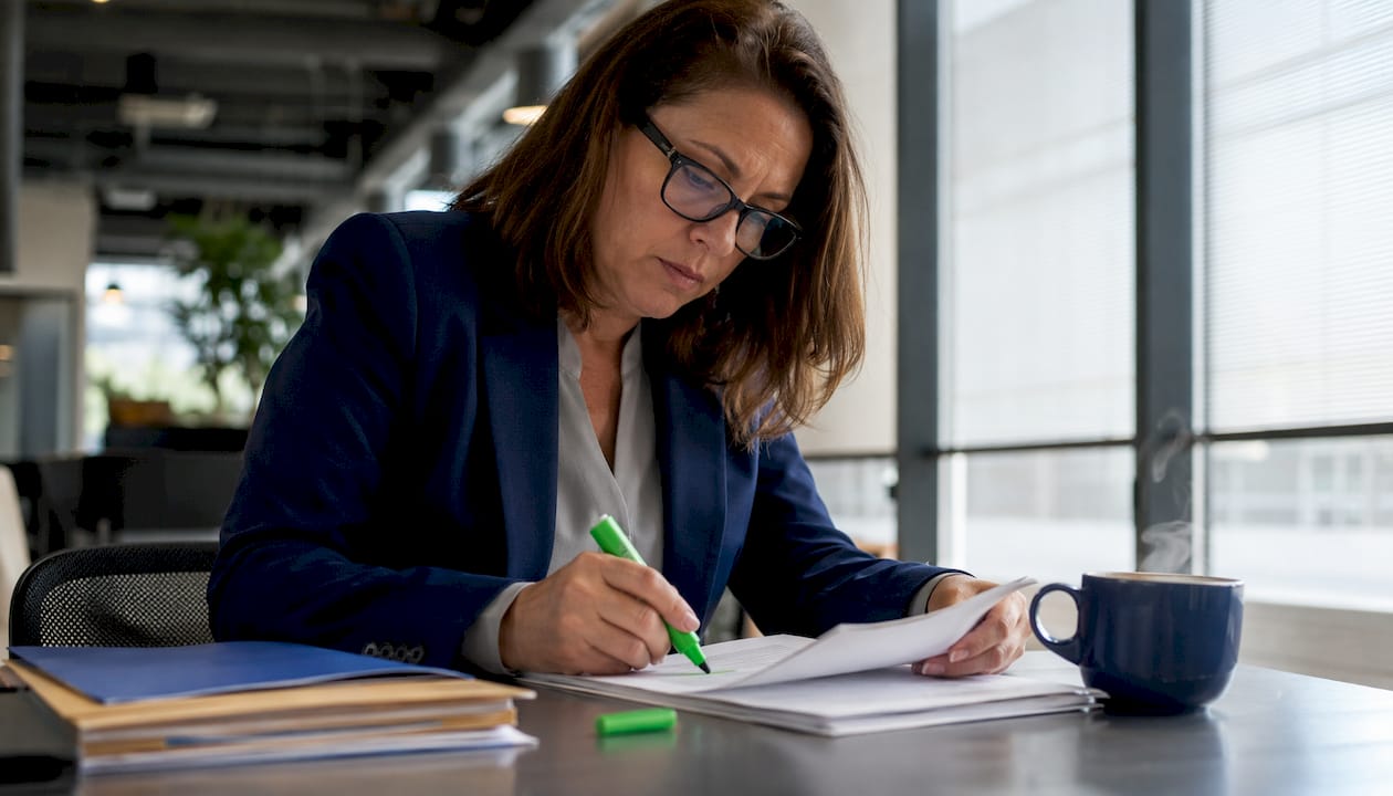 Campaign manager reviewing sign placement legal papers