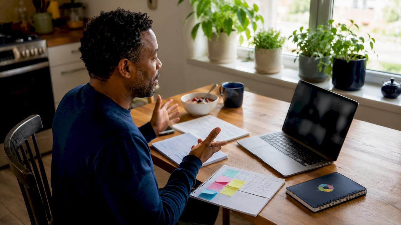 Man engaging in remote team training discussion