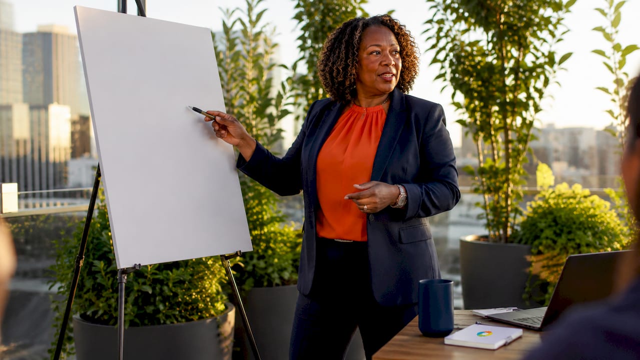 Female leader modeling culture values in meeting