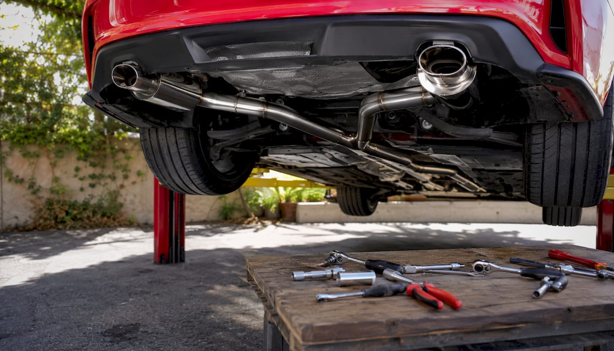 Close-up of catback exhaust on sports coupe