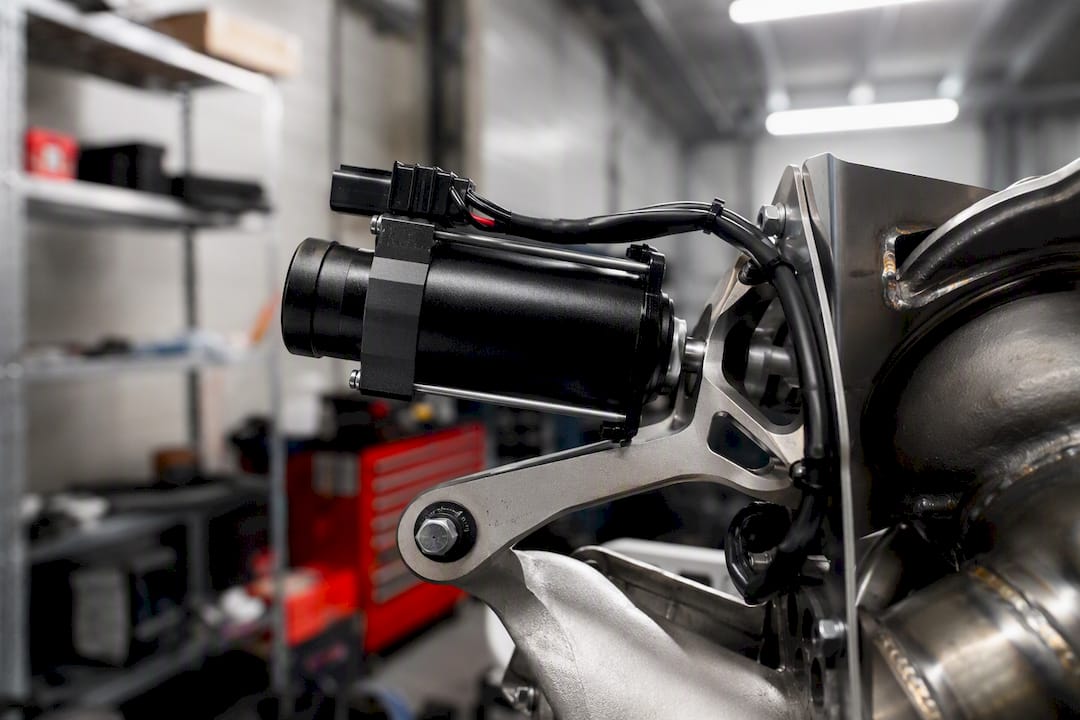 Electric valve actuator on exhaust system