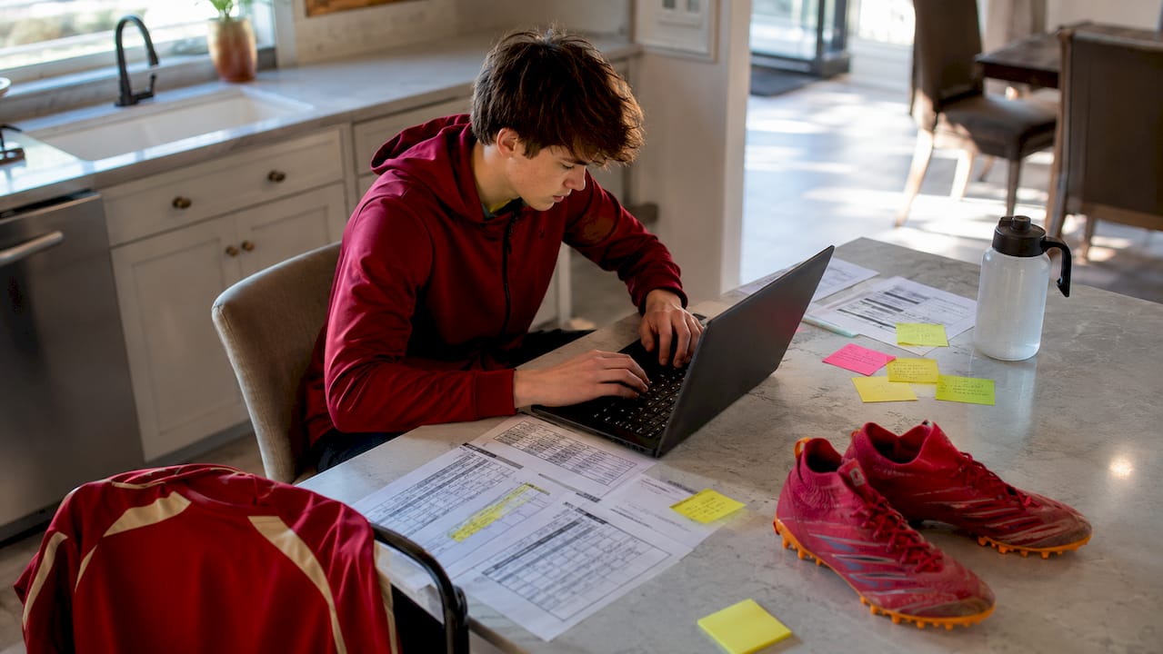 Teen soccer player emailing coaches pre-showcase