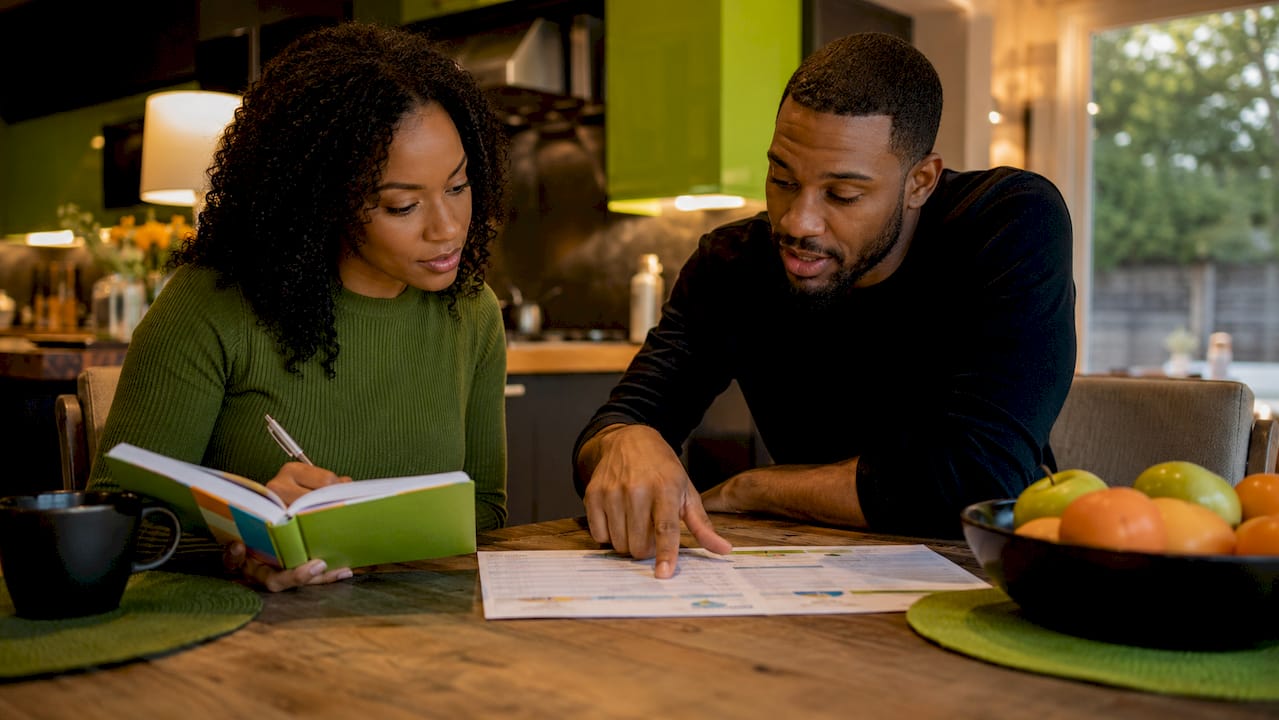 Couple consulting home equity loan options