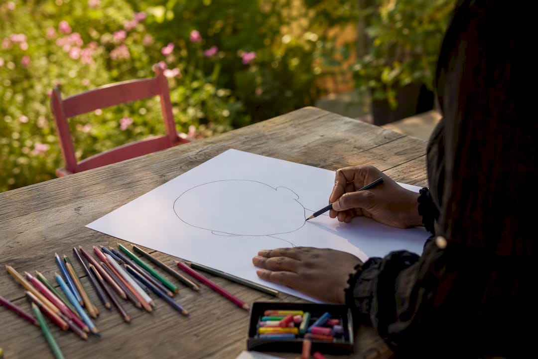 Teacher sketching custom emotions coloring page