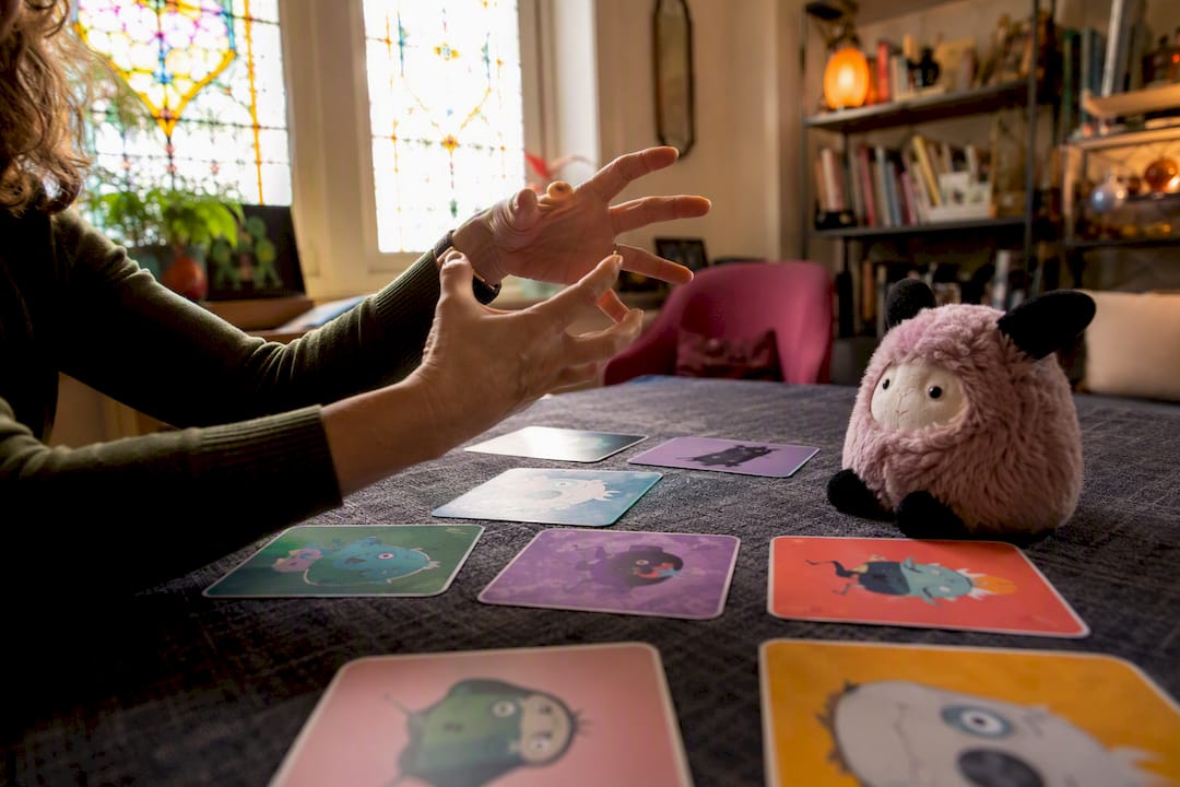 Therapist hands performing expressive storytelling gesture