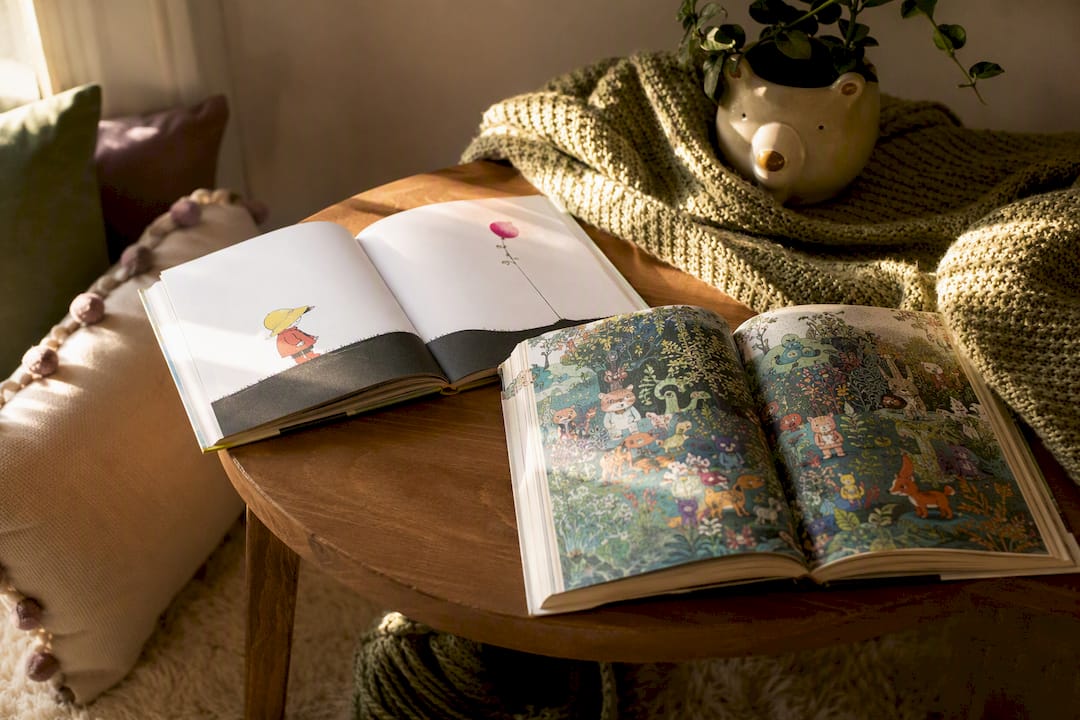 Two wordless picture books with contrasting illustration styles