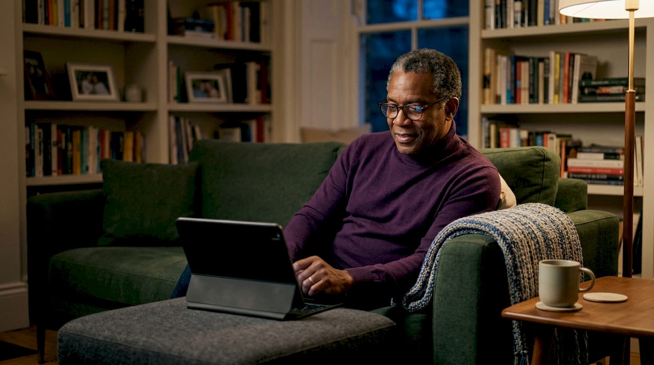 Man using meditation app for anxiety at home