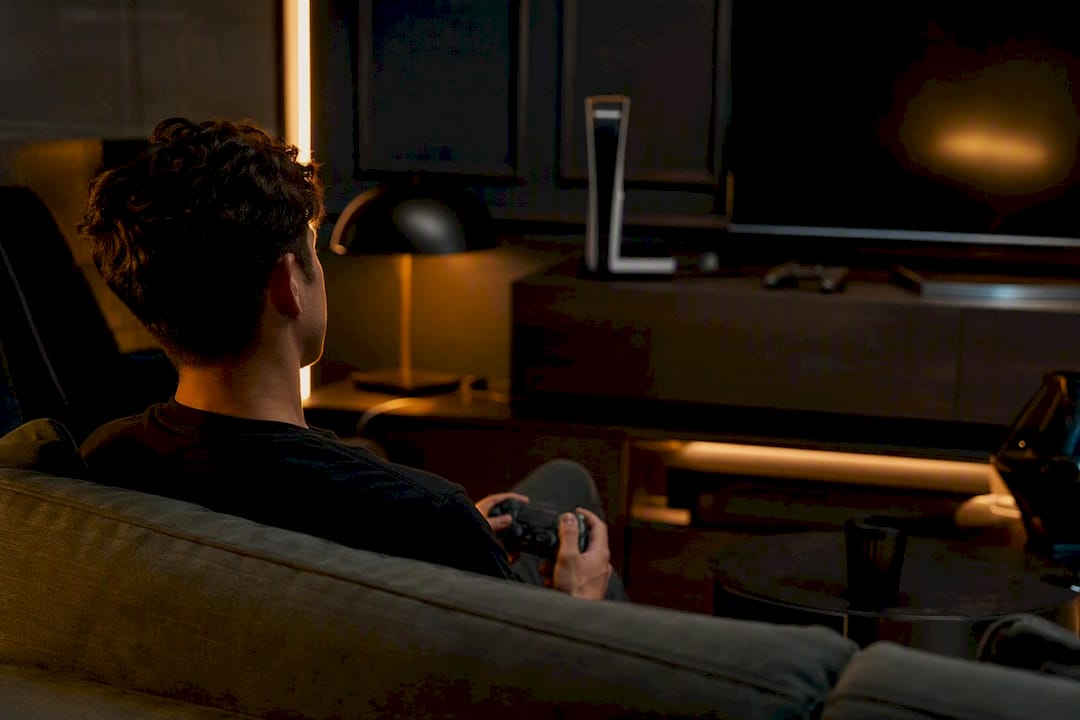 Dark gaming lobby with warm golden highlights