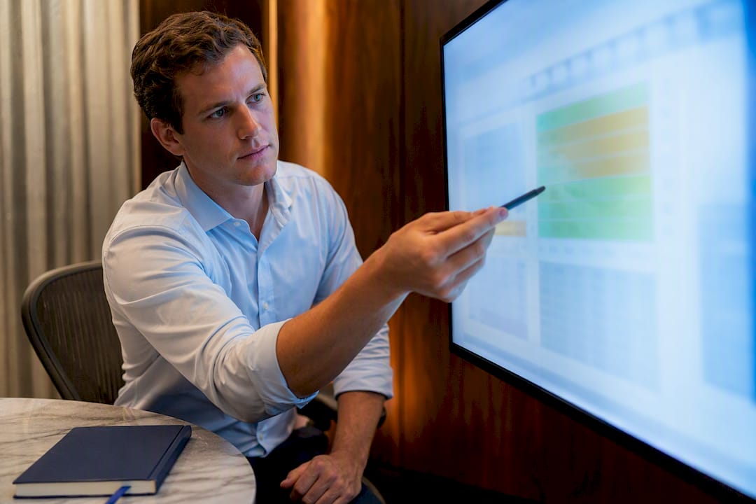 Analyst reviewing real estate sensitivity grid