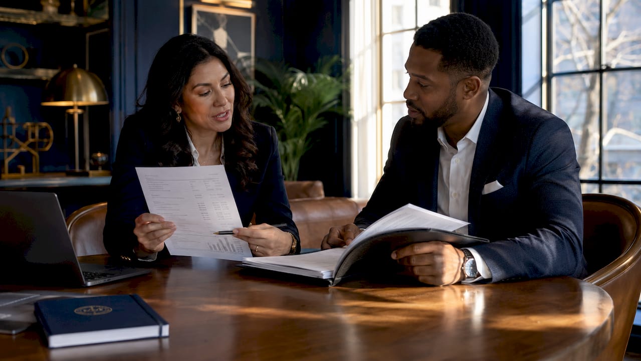 Professionals discussing commercial loan underwriting