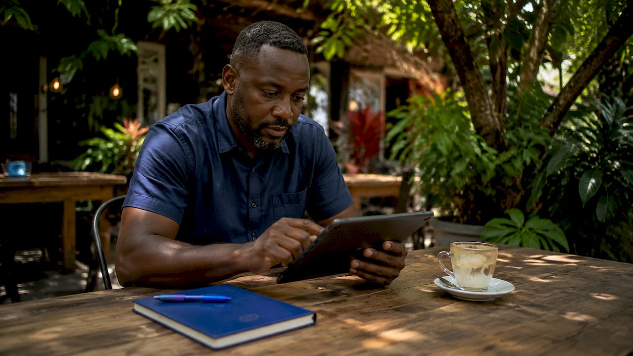Man personalizing customer service via tablet