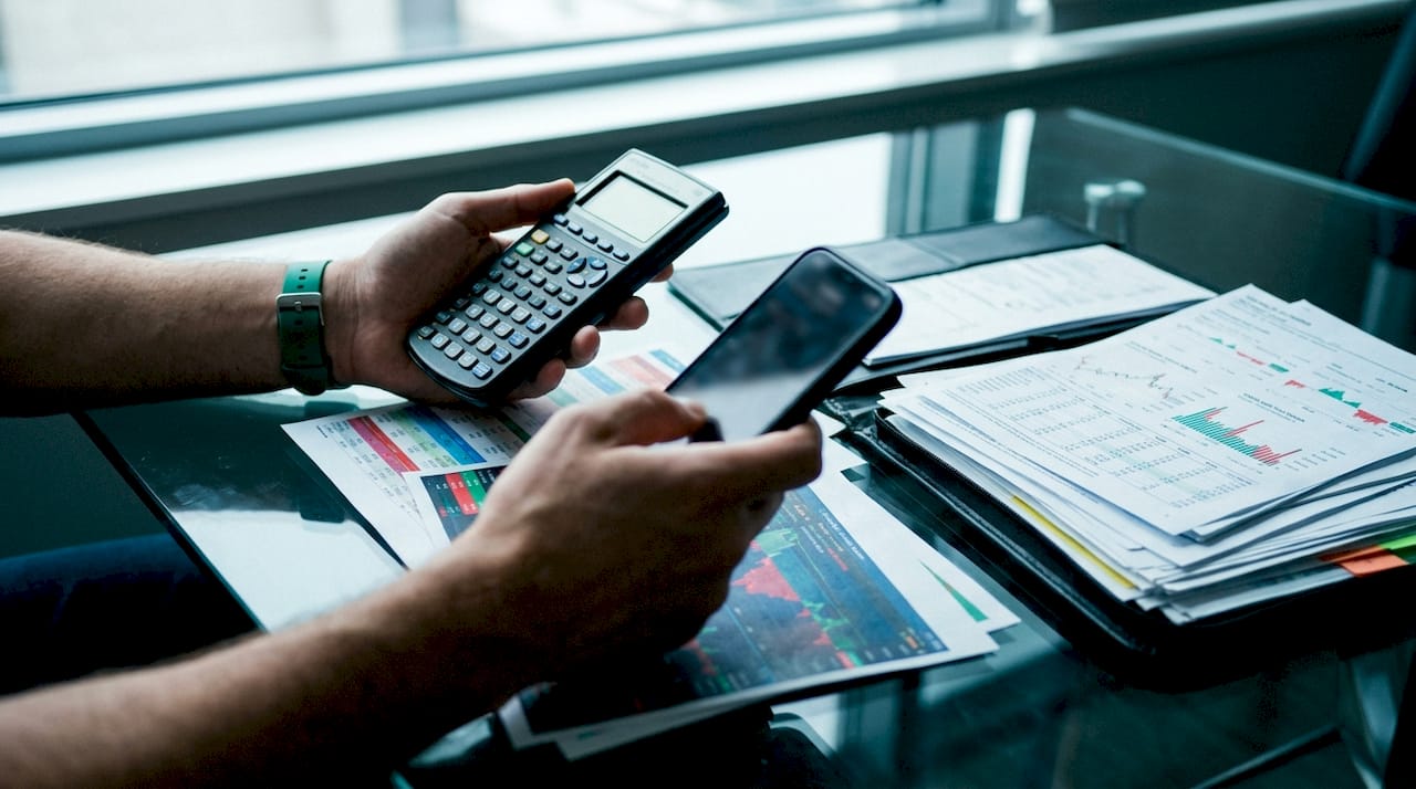 Hands executing options volume trade on table