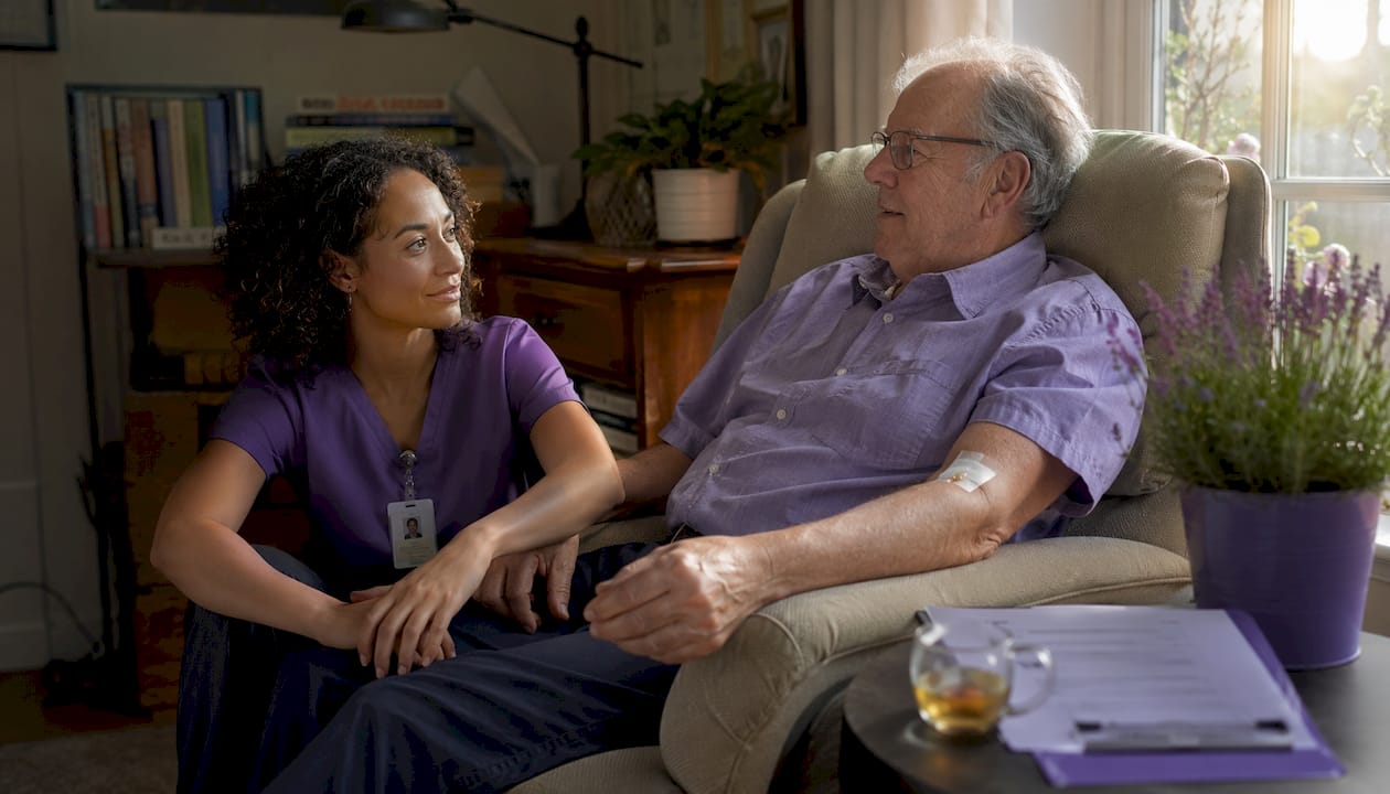 Oncology nurse consulting cancer patient at home