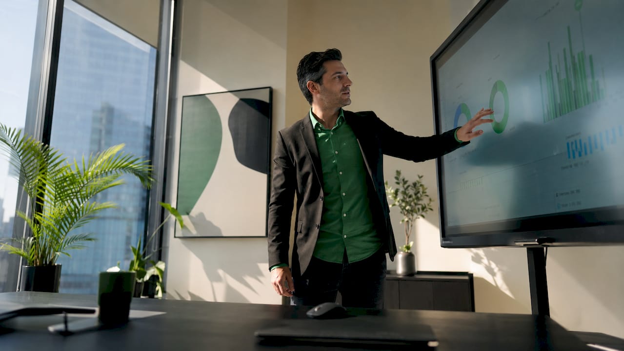 Hands interacting with email marketing dashboard